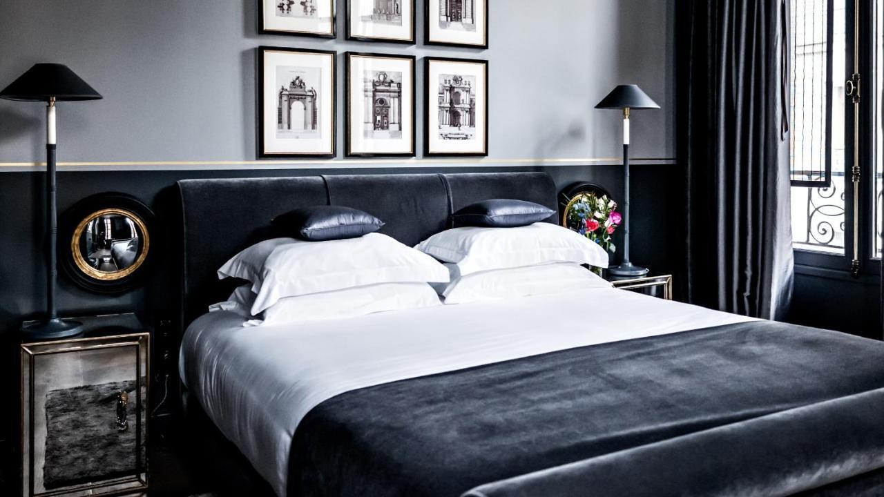ムッシュー ジョルジュ ホテル&スパ シャンゼリゼ パリ エクステリア 写真 A bedroom at the hotel