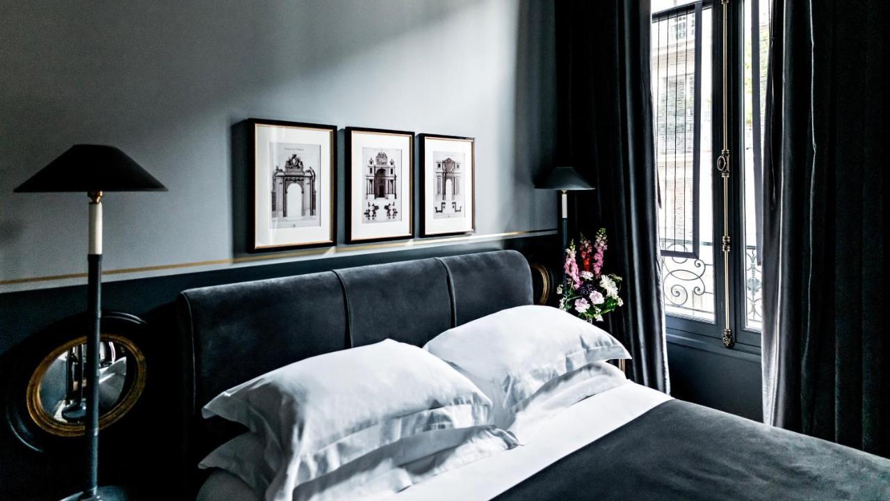 ムッシュー ジョルジュ ホテル&スパ シャンゼリゼ パリ エクステリア 写真 A bedroom at the Hotel 57